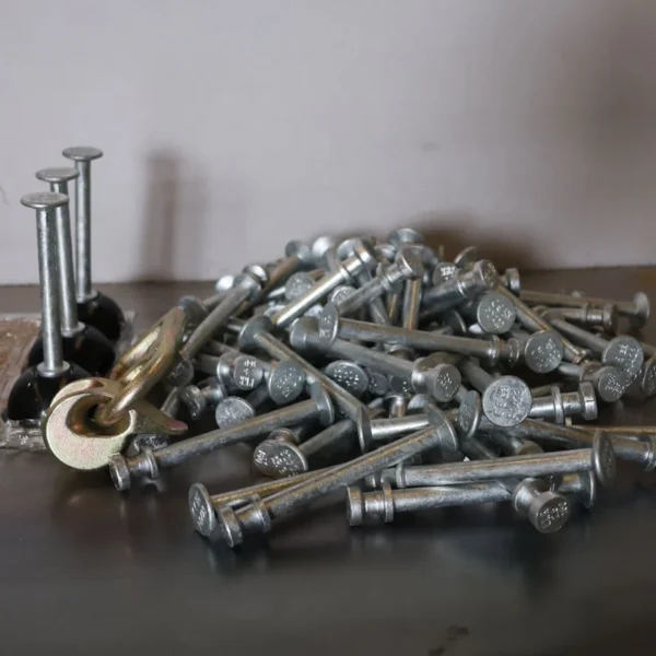 Lifting pins, mould formers and a lifting clutch for concrete blocks