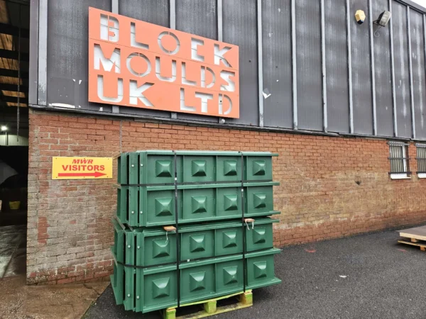 Green block moulds on a pallet ready for delivery