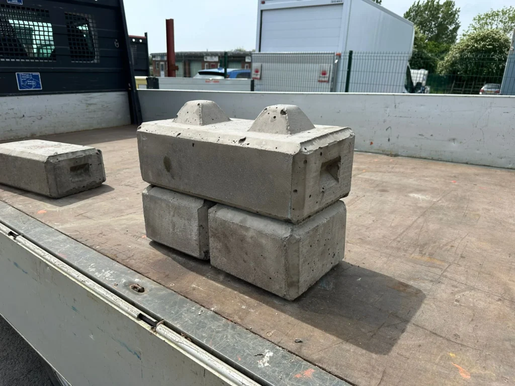 Interlocking concrete blocks on a truck bed